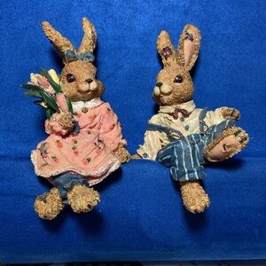 A family of Easter Bunnies and tree bedecked with colorful eggs in one lot.